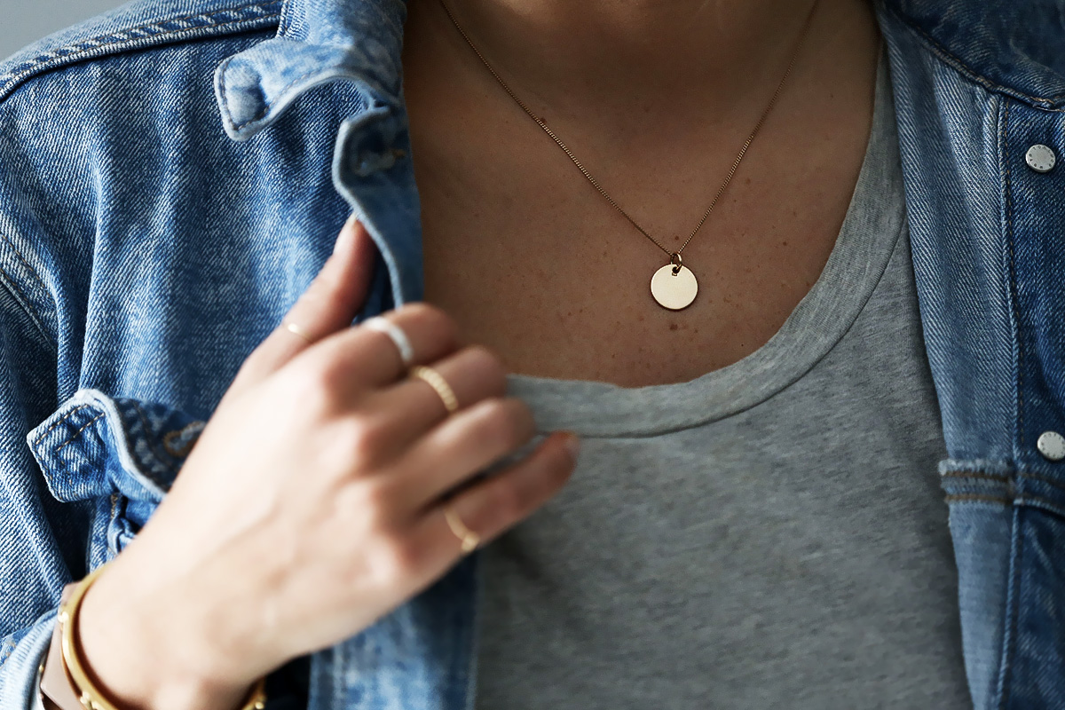 Blogger Lisa Hamilton from See Want Shop styling a fine rose gold necklace from Eastland